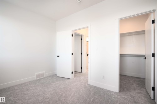 165 Edgewater Cir, Leduc, AB - Indoor Photo Showing Other Room