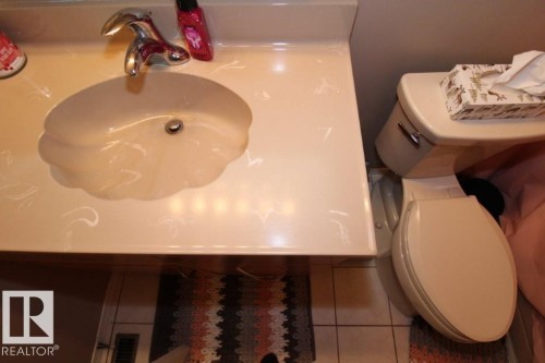 Bathroom view of toilet and vanity - 2812 35 Street Nw, Edmonton, AB - Indoor Photo Showing Bathroom