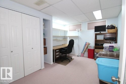 Home office featuring a paneled ceiling and light carpet - 2812 35 Street Nw, Edmonton, AB - Indoor