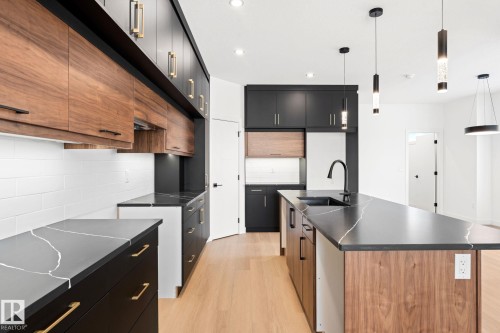 94 Blackbird Bend, Fort Saskatchewan, AB - Indoor Photo Showing Kitchen With Upgraded Kitchen