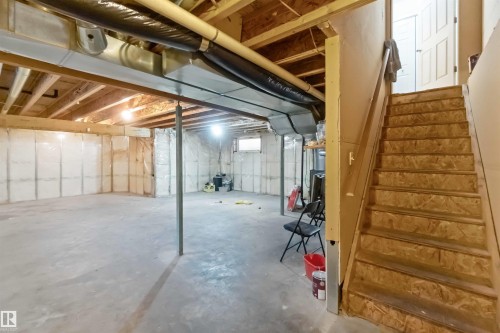 Unfinished below grade area featuring stairway - 4507 164A Avenue, Edmonton, AB - Indoor Photo Showing Basement