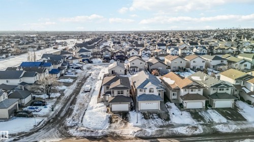 Snowy aerial view featuring a residential view - 4507 164A Avenue, Edmonton, AB - Outdoor With Facade