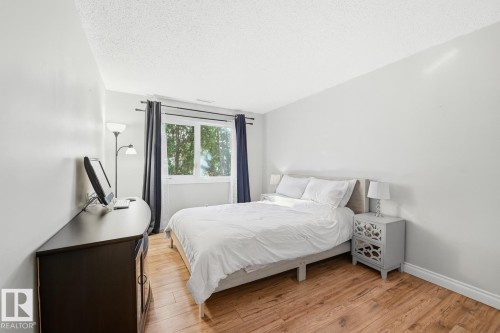 204 14810 51 Avenue, Edmonton, AB - Indoor Photo Showing Bedroom