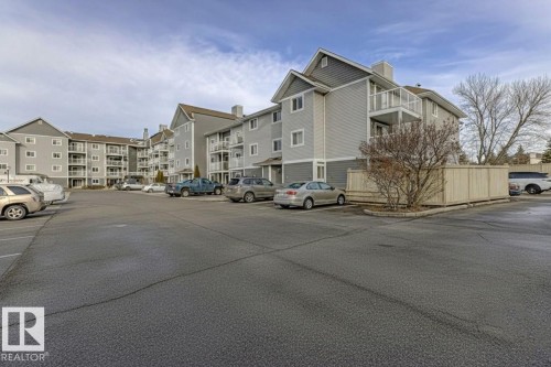 View of apartment building / complex with uncovered parking - #117 5005 31 Avenue, Edmonton, AB - Outdoor