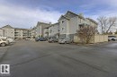 View of apartment building / complex with uncovered parking - #117 5005 31 Avenue, Edmonton, AB  - Outdoor 