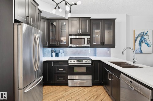 401 10504 99 Avenue, Edmonton, AB - Indoor Photo Showing Kitchen With Stainless Steel Kitchen With Double Sink With Upgraded Kitchen