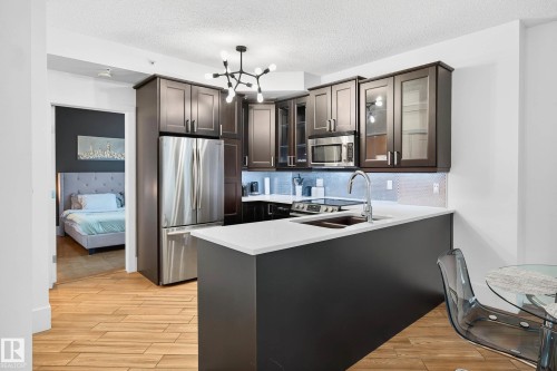 401 10504 99 Avenue, Edmonton, AB - Indoor Photo Showing Kitchen With Stainless Steel Kitchen With Double Sink With Upgraded Kitchen