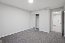 Unfurnished bedroom featuring carpet and a closet - 