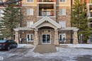 View of snow covered building - 115 2098 Blackmud Creek Drive, Edmonton, AB  - Outdoor With Balcony With Facade 
