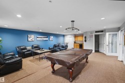 Game room with light carpet, recessed lighting, and pool table - 