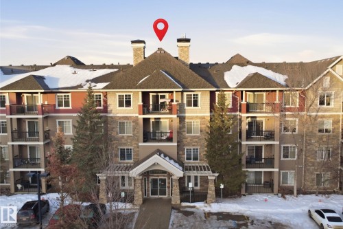 Snowy aerial view featuring a residential view - 115 2098 Blackmud Creek Drive, Edmonton, AB - Outdoor With View