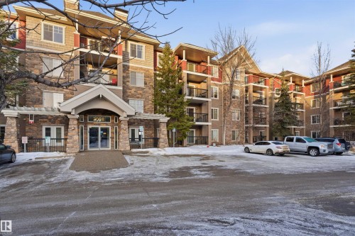 Building lobby with a high ceiling - 115 2098 Blackmud Creek Drive, Edmonton, AB - Indoor Photo Showing Other Room