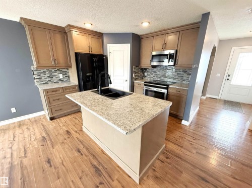 14005 158A Avenue, Edmonton, AB - Indoor Photo Showing Kitchen With Double Sink