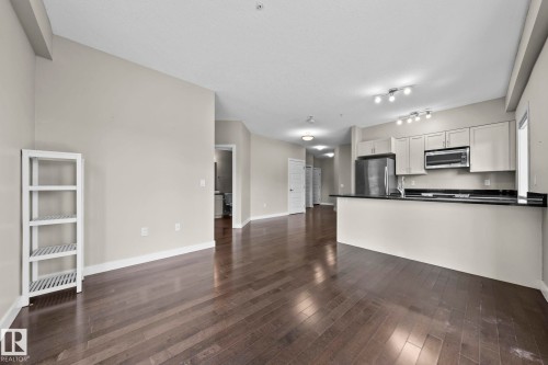 114 1230 Windermere Way Sw, Edmonton, AB - Indoor Photo Showing Kitchen With Upgraded Kitchen