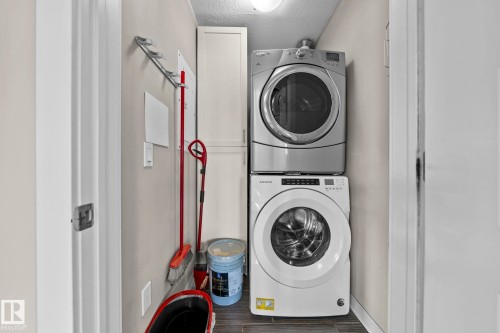 114 1230 Windermere Way Sw, Edmonton, AB - Indoor Photo Showing Laundry Room