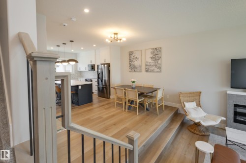 205 Caledonia Drive, Leduc, AB - Indoor With Fireplace