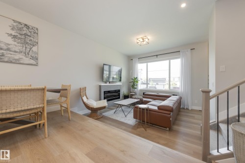 205 Caledonia Drive, Leduc, AB - Indoor With Fireplace