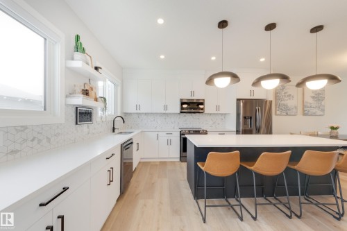 205 Caledonia Drive, Leduc, AB - Indoor Photo Showing Kitchen With Upgraded Kitchen