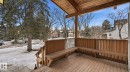Snow covered deck featuring a residential view - 11520 78 Avenue Nw, Edmonton, AB  - Outdoor With Deck Patio Veranda With Exterior 