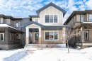 Craftsman-style home with a porch and board and batten siding - 4008 Allan Crescent, Edmonton, AB  - Outdoor With Facade 