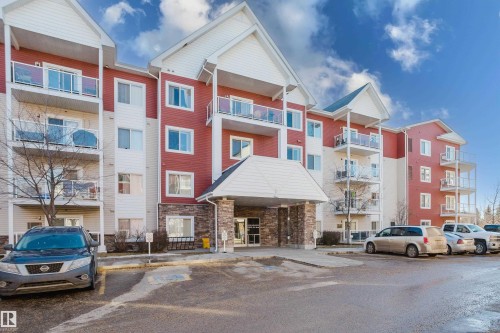 View of apartment building / complex featuring uncovered parking - 415 2203 44 Avenue, Edmonton, AB - Outdoor With Facade
