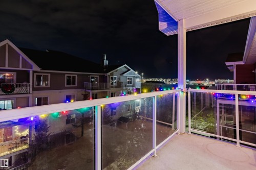 Pool at night with a balcony - 415 2203 44 Avenue, Edmonton, AB - Outdoor