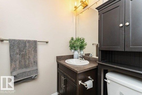Bathroom featuring vanity and toilet - 6649 Cardinal Road Sw, Edmonton, AB - Indoor Photo Showing Bathroom