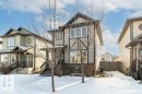 View of front of home featuring stone siding - 6649 Cardinal Road Sw, Edmonton, AB  - Outdoor With Facade 