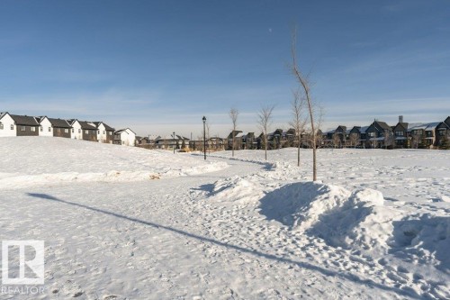View of yard featuring a residential view - 6649 Cardinal Road Sw, Edmonton, AB - Outdoor With View