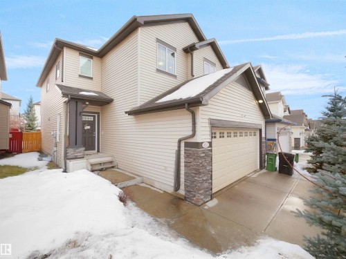Traditional home with a garage and stone siding - 6115 11 Avenue, Edmonton, AB - Outdoor