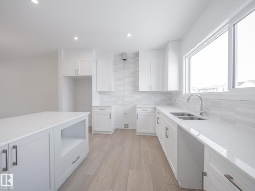17311 6 Street, Edmonton, AB - Indoor Photo Showing Kitchen With Double Sink