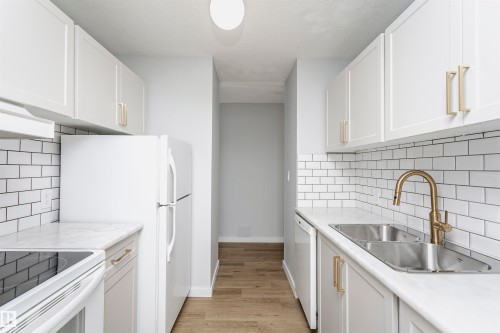 1004 11307 99 Avenue, Edmonton, AB - Indoor Photo Showing Kitchen With Double Sink