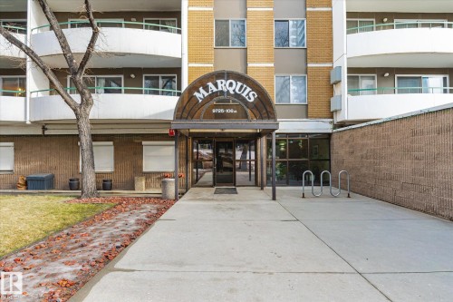 Entrance to property with brick siding - 304 9725 106 Street, Edmonton, AB - Outdoor With Facade