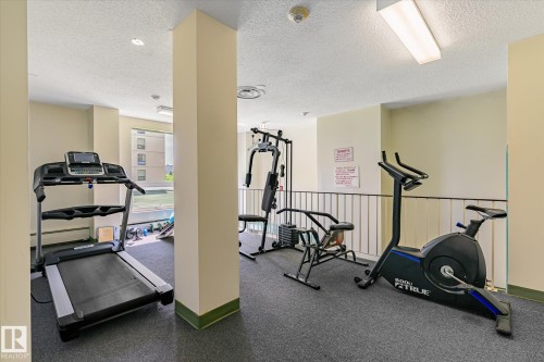 Gym featuring a textured ceiling - 304 9725 106 Street, Edmonton, AB - Indoor Photo Showing Gym Room