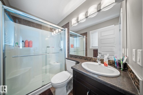Bathroom with vanity and a shower stall - 8107 224 Street Nw, Edmonton, AB - Indoor Photo Showing Bathroom