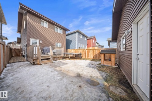 Back of property featuring a fenced backyard and a deck - 8107 224 Street Nw, Edmonton, AB - Outdoor With Exterior
