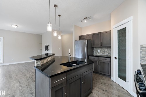 3403 Graybriar Green, Stony Plain, AB - Indoor Photo Showing Kitchen With Double Sink