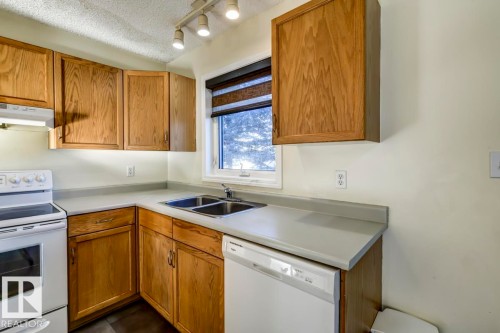 16 4020 21 Street, Edmonton, AB - Indoor Photo Showing Kitchen With Double Sink