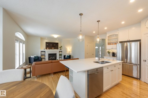 2532 Bell Court, Edmonton, AB - Indoor Photo Showing Kitchen With Fireplace With Double Sink