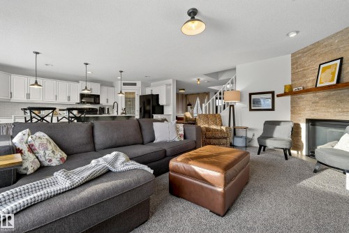 11709 13A Avenue, Edmonton, AB - Indoor Photo Showing Living Room With Fireplace