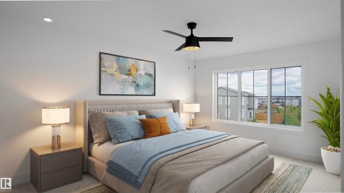 Carpeted bedroom with a ceiling fan and baseboards - 711 31 Avenue, Edmonton, AB - Indoor Photo Showing Bedroom