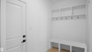 Mudroom featuring light wood-style floors and baseboards - 711 31 Avenue, Edmonton, AB  - Indoor Photo Showing Other Room 