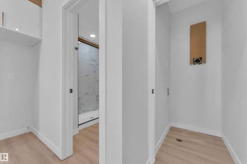 Hallway featuring light wood-style flooring and recessed lighting - 9531/ 9533 115 Ave, Edmonton, AB - Indoor Photo Showing Other Room