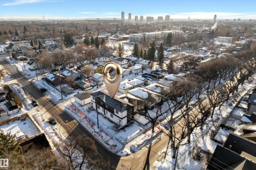 Aerial overview of property's location with nearby urban area - 9531/ 9533 115 Ave, Edmonton, AB - Outdoor With View