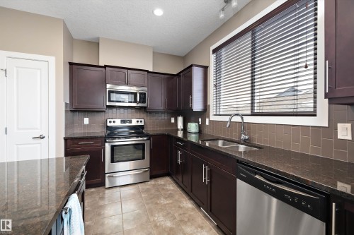 1074 Watt Promenade, Edmonton, AB - Indoor Photo Showing Kitchen With Stainless Steel Kitchen With Double Sink