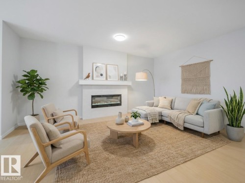 17527 7 Street, Edmonton, AB - Indoor Photo Showing Living Room With Fireplace