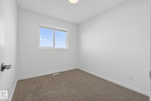 2416 Trumpeter Way, Edmonton, AB - Indoor Photo Showing Other Room
