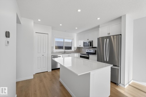2416 Trumpeter Way, Edmonton, AB - Indoor Photo Showing Kitchen With Upgraded Kitchen