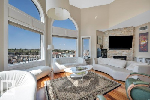 401 30 St Joseph Street, St. Albert, AB - Indoor Photo Showing Living Room With Fireplace
