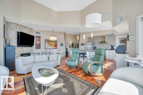 401 30 St Joseph Street, St. Albert, AB - Indoor Photo Showing Living Room With Fireplace